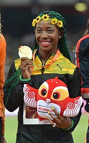 Women's_100_m_podium_Beijing_2015_cropped.jpg